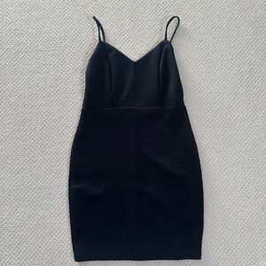 Black mini dress with mesh detailing on back